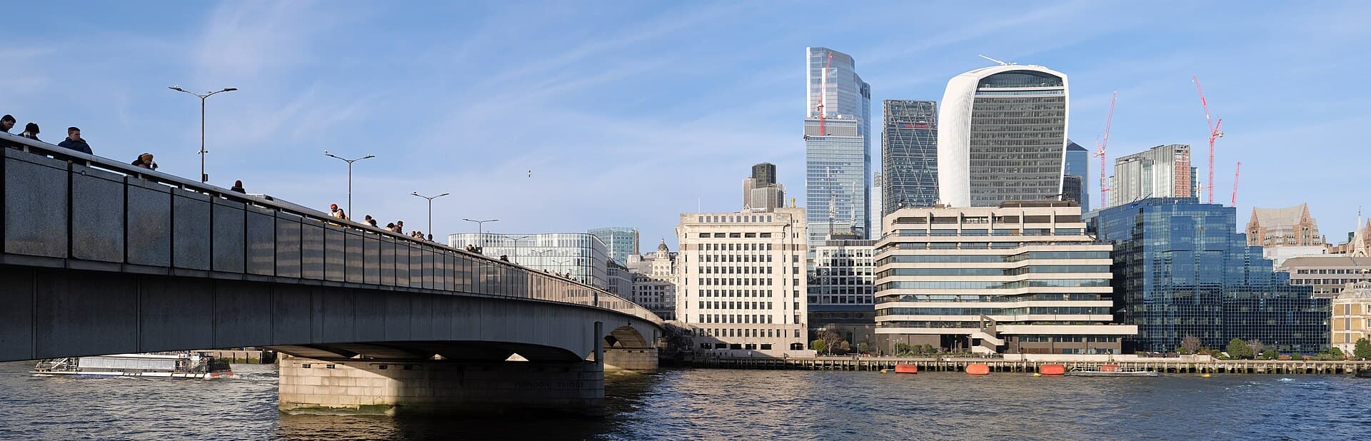 London Bridge over the River Thames, with the City of London skyline behind it